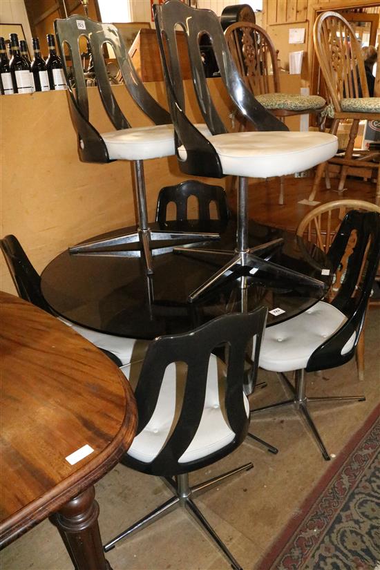 Swedish glass top circular table and 6 chairs(-)
